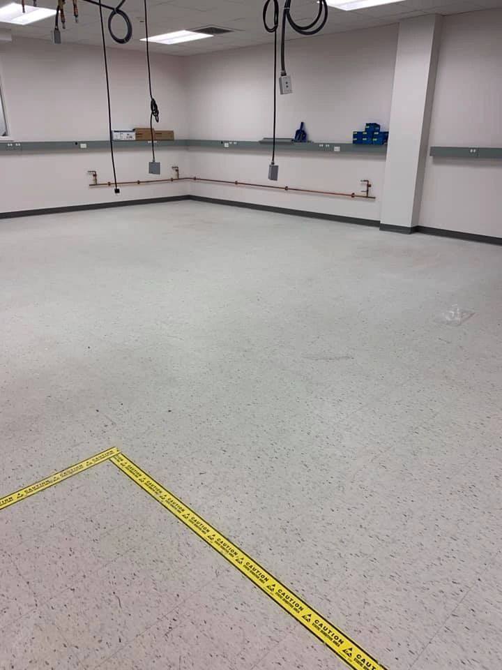 Before: worn studio floor
