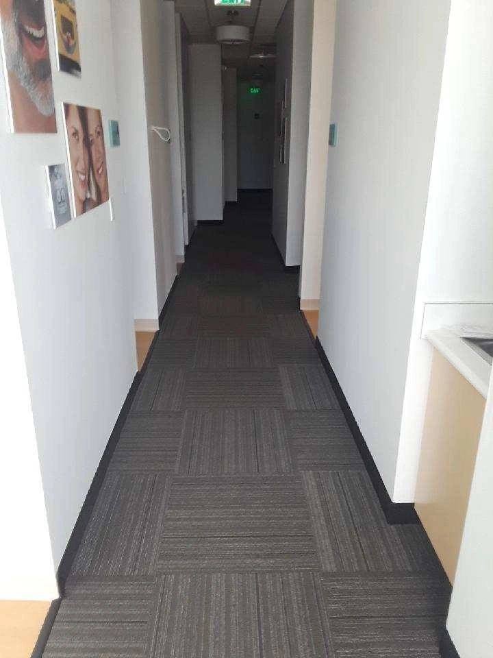 Office hallway carpet, vacuumed and detailed